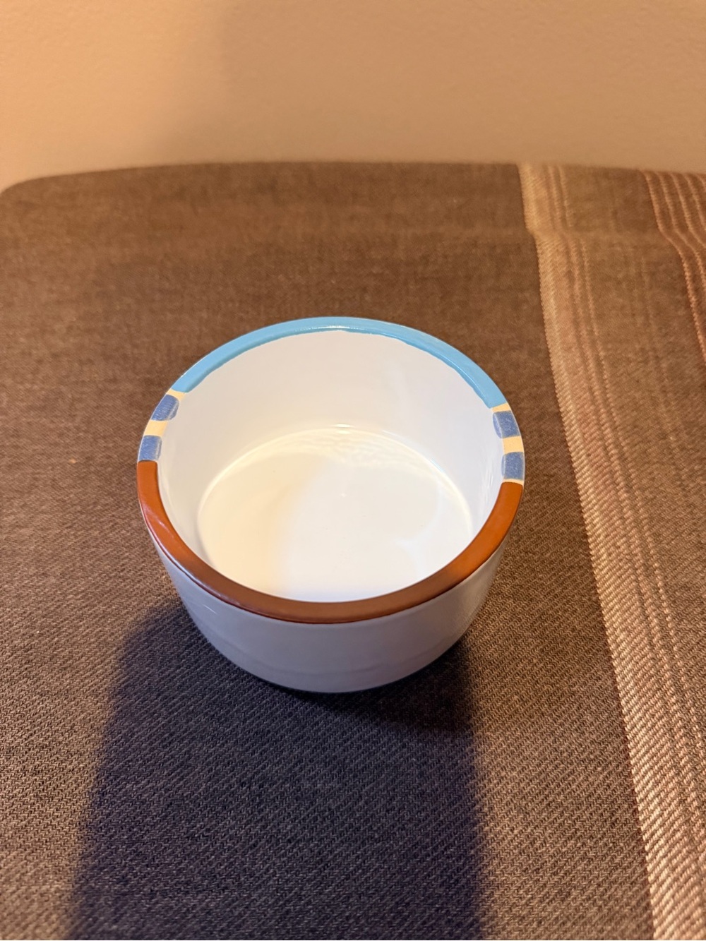 Dansk White Ceramic Bowl with Blue and Brown Accent Rim